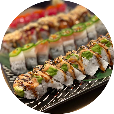 <b>SUISEIN SET</b>: California Roll, Green Dragon Roll, Volcano Dynamite Roll, Spicy Tuna Roll. 3 sodas of your choice. Set for 1-3 people.
