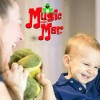 Toddler laughing during a Music with Mar class